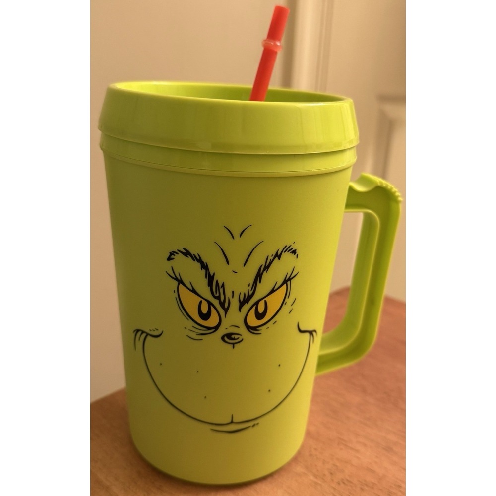 "The Grinch" plastic jumbo tumbler, often referred to as a Grinch Guzzler. New